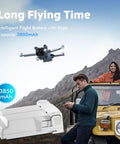 Intelligent Flight Battery Plus For Mini 4 Pro Mini 3 And Mini 3 Pro 3850mAh with drone and couple outdoors