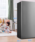 No Sweat 21 Cubic Foot Upright Convertible Freezer And Refrigerator With Built Tough Stainless Steel Exterior in home setting.