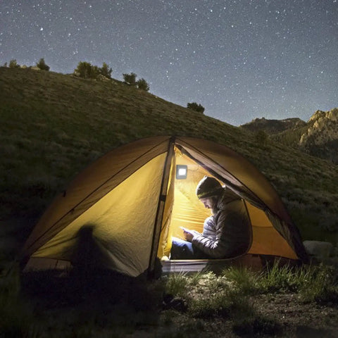 Super Bright Battery Operated Closet Light 200 Lumen COB LED Tap Lights Stick Anywhere Four Pack illuminating a tent.