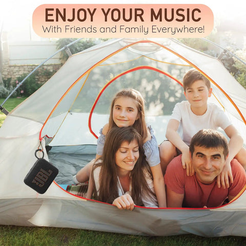 Go 4 Portable Bluetooth Speaker With IP67 Waterproof And Dustproof Build, 7 Hours Playback hanging outside a tent with family inside