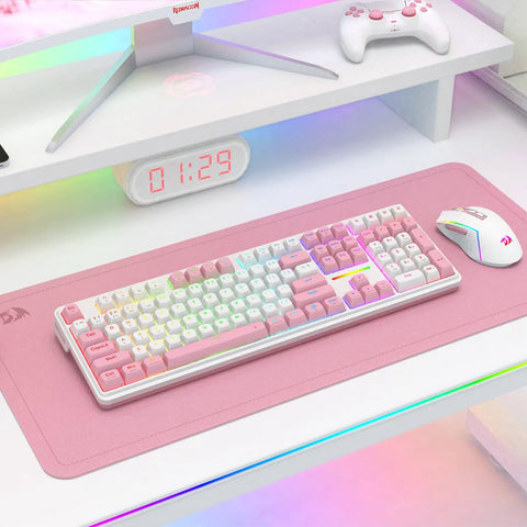 Beast Mode Full Size Gaming Keyboard With Real Gasket Mount And Dope Rgb Backlighting featuring white and pink keys on a soft pad.