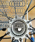 Five Sets Of Ten Types Bike Bearing Kit With Headset Retainers For Crank And Caged Wheel Repairs on white bike hub