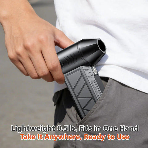 Person holding Cordless Air Duster With 130000 RPM Motor, 50 Meters Per Second Hurricane Wind, 4 Speed Modes, pocket-sized design