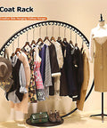 Freestanding clothing rack with dresses and accessories; Industrial Style Heavy Duty Coat Rack For Home And Store Display
