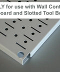 White slotted metal pegboard corner with attachment slot for wall mount storage, labeled for compatible use.