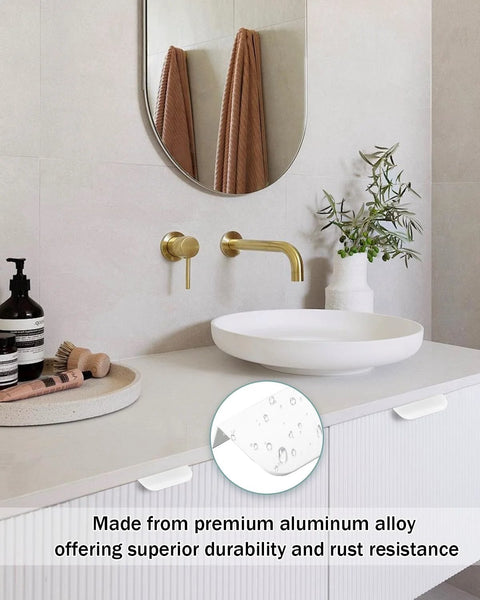 6 Pack Adhesive Edge Pulls for Cabinets and Drawers installed on bathroom cabinet, matte white finish, highlighting rust-resistant material.
