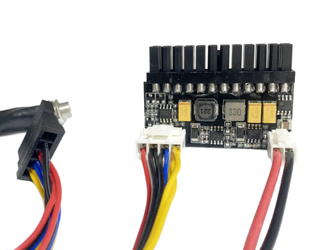 150 Watt Mini ITX ATX Power Supply With 24 Pin DC Input Plug And Play Car And Motorcycle Ready ATX Adapter Board 12V DC Input Short Circuit Protected Compact Low Profile Power Solution For ITX Mainboards And Crypto Mining. close-up of mini-ITX power adapter board with 24-pin connector and wired plugs