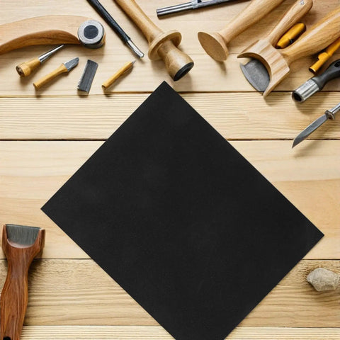 Twenty Pack Of Premium Wet Dry Sanding Sheets 11x9 Inch Assortment For Car Detailing Auto Polishing Metal Finishing Waterproof Grits on wood surface.