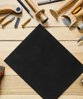 Ultimate 20pc Wet Sanding Paper Sheets 11x9 Inches Assorted Fine Grits on wooden table with tools.