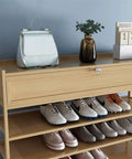 Real Game Changer Stackable Shoe Rack Organizer Vertical Ten Tier Tower With Top Compartment, shoes and bag on display.