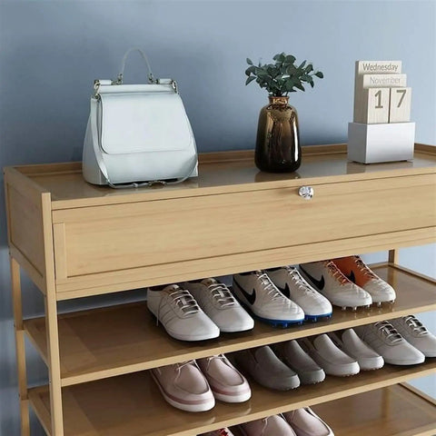 Real Game Changer Stackable Shoe Rack Organizer Vertical Ten Tier Tower With Top Compartment, shoes and bag on display.
