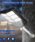 Solar Street Light Outdoor Waterproof Flood Light With 6000 Lumen 6500K LED, mounted on a wall in rain, close-up view.