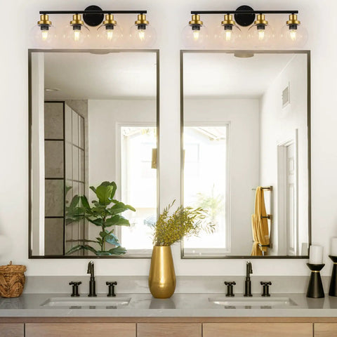 4 Light Vintage Style Bathroom Vanity Light Fixture With Clear Globe Glass Shades, Black And Brass Gold Accents over mirrors