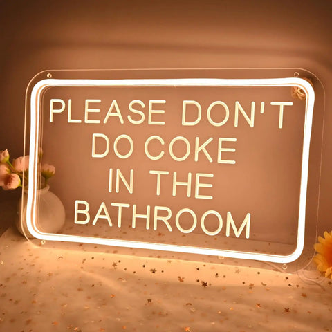 Please Don't Do Coke In The Bathroom LED Neon Sign USB Powered For Bedroom Game Room Bar Or Home Decor glowing on table