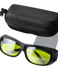 TRQWH laser safety glasses with yellow-green lenses, black frame; includes zip case and cleaning cloth.