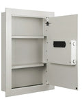 Open view of hidden in-wall safe with keypad and two manual override keys for home or office, showcasing interior storage compartments.