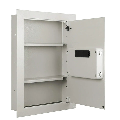 Open view of hidden in-wall safe with keypad and two manual override keys for home or office, showcasing interior storage compartments.