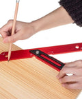 Hands using Dual Angle 45 And 135 Degree Woodworking Ruler Rugged Pro Grade Aluminum Carpenter Measuring Tool on wood