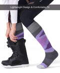 Merino Wool Womens Ski Socks 2 Pack Full Cushion Thermal All Day Cozy Winter Socks For Skiing And Snowboarding Reinforced Heel And Toe Rose And Purple Medium Size worn with snowboard boots.