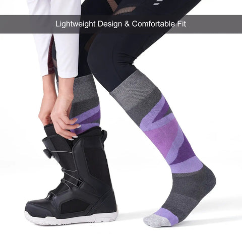 Merino Wool Womens Ski Socks 2 Pack Full Cushion Thermal All Day Cozy Winter Socks For Skiing And Snowboarding Reinforced Heel And Toe Rose And Purple Medium Size worn with snowboard boots.