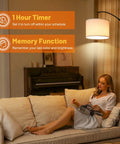 Woman relaxing under 81-inch arc floor lamp with remote control, dimmable LED, stepless color temperature, cozy corner lighting