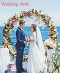 Outdoor wedding ceremony with couple under a floral decorated arch near the ocean, Metal Arch Backdrop Stand 8 Ft Wide 7 Ft High For Weddings.