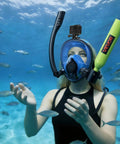 Diver using Mini 0.5L Scuba Tank Portable Underwater Breathing Cylinder For Short Dives Up To 10 Minutes, surrounded by fish.