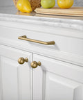 Champagne Bronze Cabinet Pulls 10 Pack 5 Inch Center To Center 128mm installed on white kitchen drawer