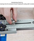 Close-up of hand adjusting Aluminum Extended Ripping Jig For Table Saws Routers And Band Saws 175 Mm Telescoping Pro Grade Woodworking Guide.