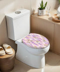 Elongated Wisteria Lilac Pretty Bright Floral Botanical Toilet Seat on a white toilet in a bright bathroom.