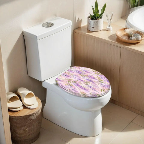 Elongated Wisteria Lilac Pretty Bright Floral Botanical Toilet Seat on a white toilet in a bright bathroom.
