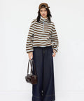 Model wearing Cozy Fleece Stripe Stand Collar Drawstring Half Zip Oversized Sweatshirt Sky Blue Medium with jeans