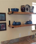 Six Piece Wall Mounted Iron Shelves Set With Heavy Duty Industrial Angle Brackets and Corner Braces holding kitchenware