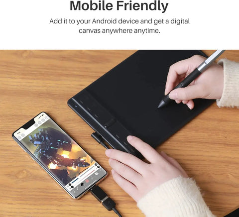 Compact Drawing Tablet With Slick Scroll Wheel And Ergonomic Stylus Delivering Sick Precision And Butter Smooth Pressure Response Perfect For Pc Artists Seeking Zero Lag Creativity And Hassle Free Setup In Sleek Black, shown with a connected smartphone.