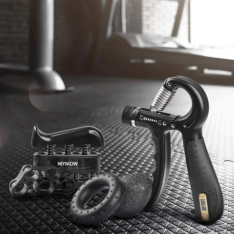 Adjustable Counting Grip Strengthener Kit 5 Pack with grip strengthener, finger trainer, ring, and ball in gym setting.