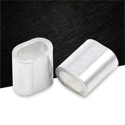 Two Heavy Duty Aluminum Cable Ferrules And Crimp Loop Sleeves M2.5 Size on a black background for secure wire termination.