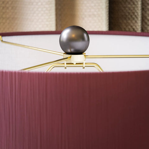 Top detail of Torino Table Lamp With Ceramic Multicolor Squares Finish, showcasing brown tapered drum shade fitting.
