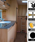 Interior RV kitchen with wood cabinets and sink, promoting Do It All Black Polyurethane Sealant Adhesive, 10.1 Fl Oz, Permanent Elastic Seal.