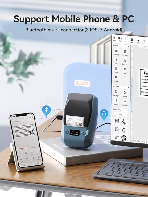 2 Inch Thermal Transfer Bluetooth Label Maker With Color Ribbon Printing For Waterproof Scratch Resistant Labels Ideal For Office Small Business School And Home Phone And PC Compatible Blue on a desk showing mobile and PC compatibility.