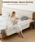 Mother with baby sitting on bed with Foldable Toddler Bed Rail 59 Inch Reinforced Carbon Steel Frame With Connectors visible