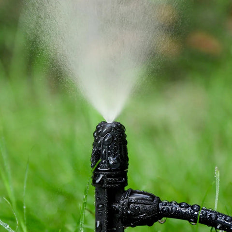Two Dozen Pcs Drip Irrigation Misting Emitters With 360 Degree Adjustable Atomizing Nozzles For One Quarter Inch Tubing on lawn