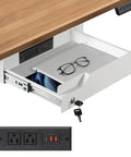 Kick Desk Chaos To The Curb With This Sleek Undermount Drawer Locker showing open drawer with laptop and eyeglasses, electrical outlets visible.