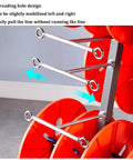 Heavy Duty Cable Spool Dispenser With Wheels For Industrial Wire Unroller showing threading hole design and mobility feature.