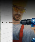 Rock Solid M35 Cobalt Drill Bits Kit Includes 10 Tough 1/8 Inch Twisted Bits Perfect For Chugging Through Hardened Metal Stainless Steel Cast Iron And All Your Tricky Woodworking Metal Drilling Projects. drill bit in handheld drill making hole in tile wall