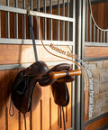Portable Saddle T Hanger For Car And Trailer Heavy Duty Headrest Saddle Rack Organizer displayed in a stable setting