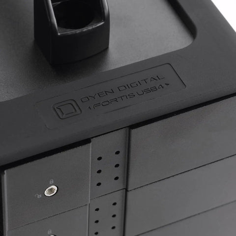 Close-up of Heavy Duty Aluminum 5 Bay USB4 40Gbps External Drive Enclosure With Silicone Grip Sleeve, showcasing bay locks.