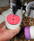 Using Six Piece PVC Pipe Reamer Kit For Drills, Plastic PVC Socket Saver Set to clean 4 inch pipe fitting in DIY plumbing project.