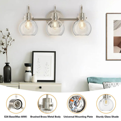 3 Bulb Brushed Nickel Wall Sconce With Clear Globe Glass Shade Totally Straight Fire Farmhouse Lighting Fixture For Bathroom Mirror And Kitchen E26 Socket Base Legit mounted over a console table.