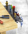 17 Inch Metal Wall Mount Hand Tool Organizer With Ultra Thin 1.4 Inch Depth holding tools on a workbench