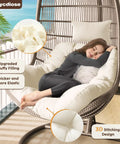 Outdoor Hanging Egg Chair Cushion Replacement Thick Waterproof Cushion With Headrest Pillow Cream Comfy Fits Most Egg Chairs 43.3 by 39.3 by 7 Inches U Shaped Lounger Cushions for Swing Chairs displayed in use on balcony.